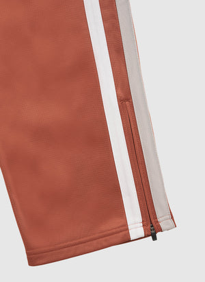 DMWU Evolution Trackpants - Rust