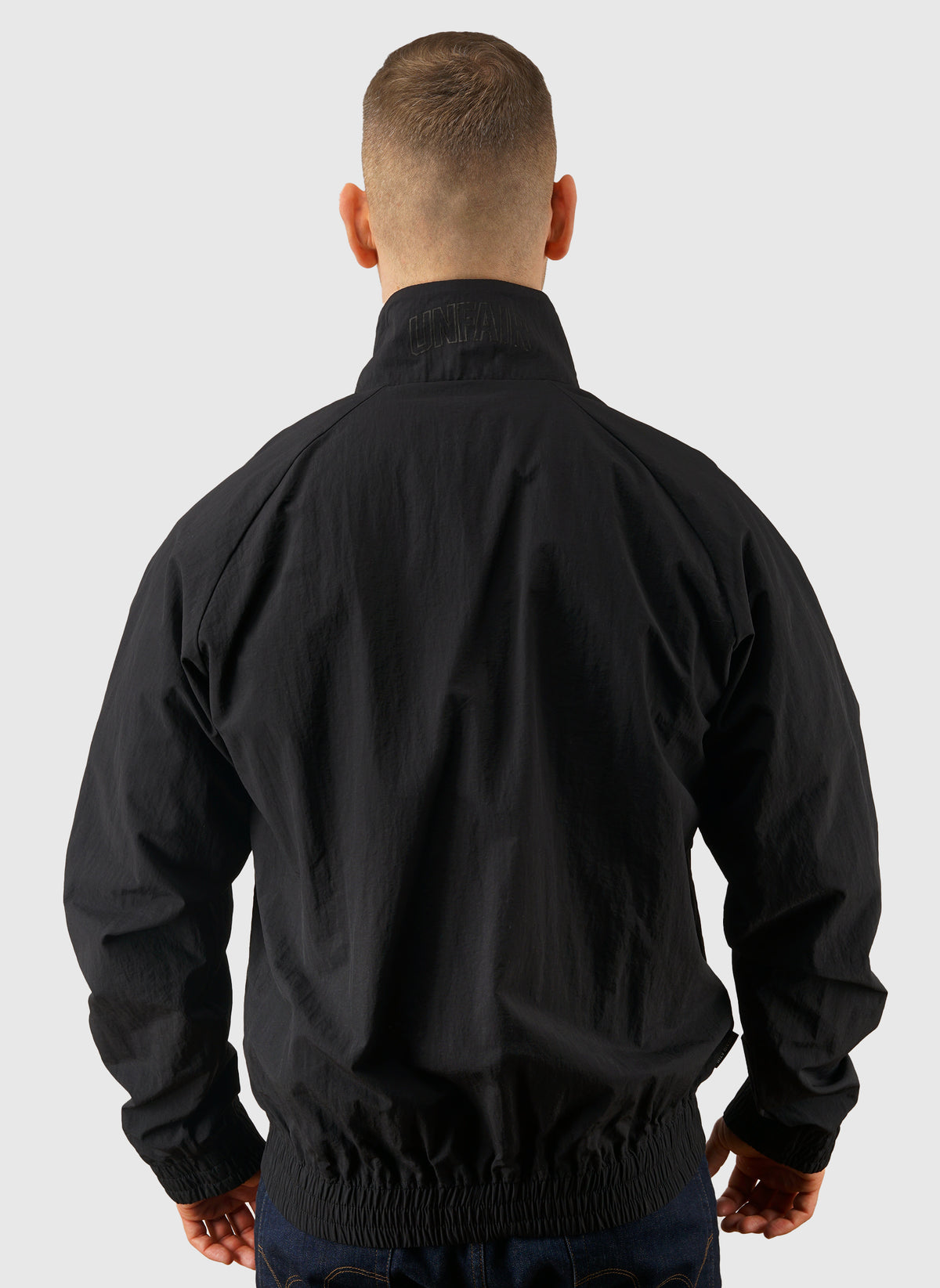 Curved Crushed Nylon Tracktop - Black