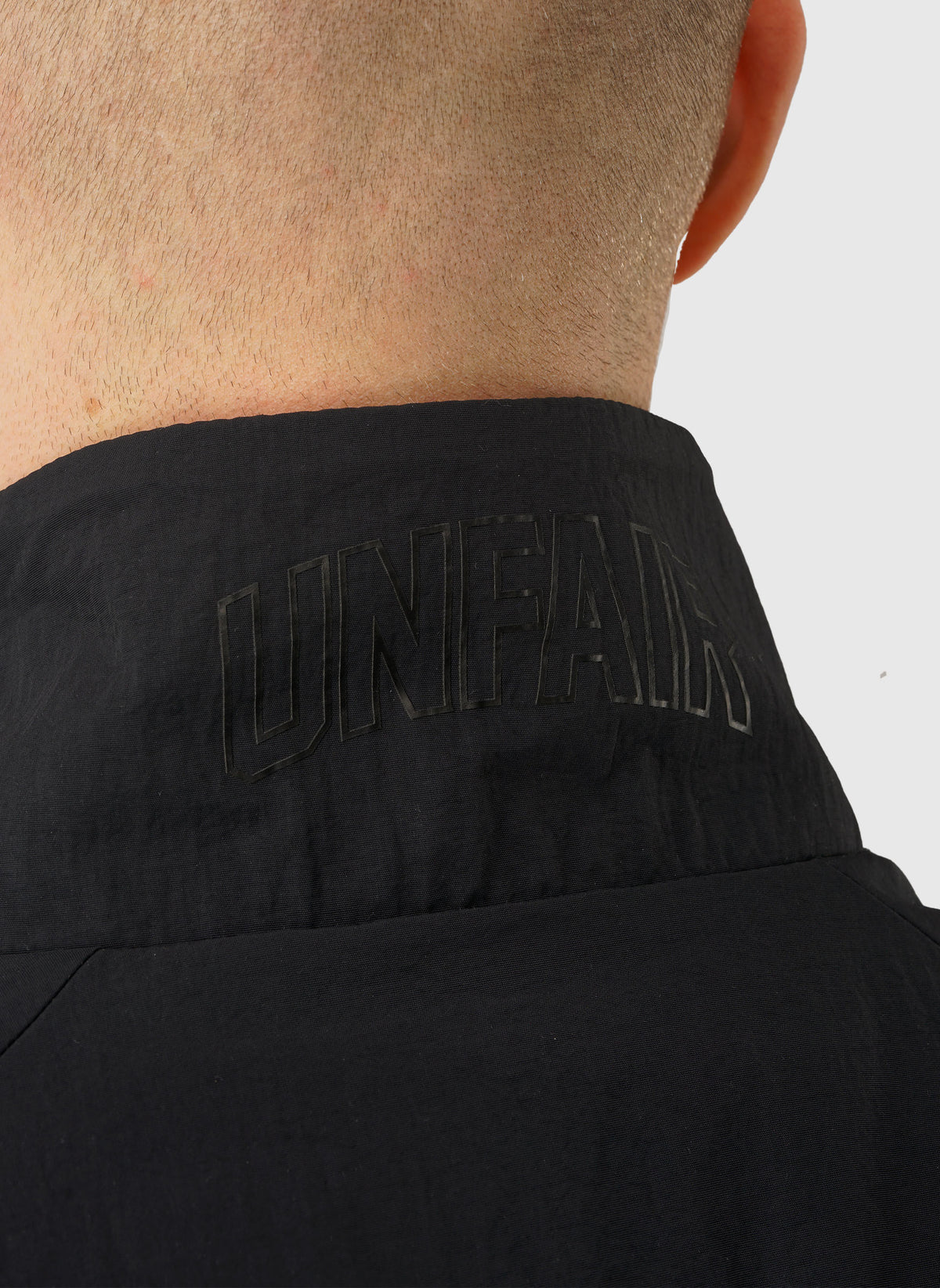 Curved Crushed Nylon Tracktop - Black